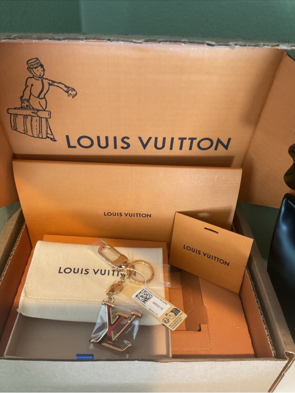 Louis Vuitton Gold and Cream LV Charm Keyring with Branded Pouch